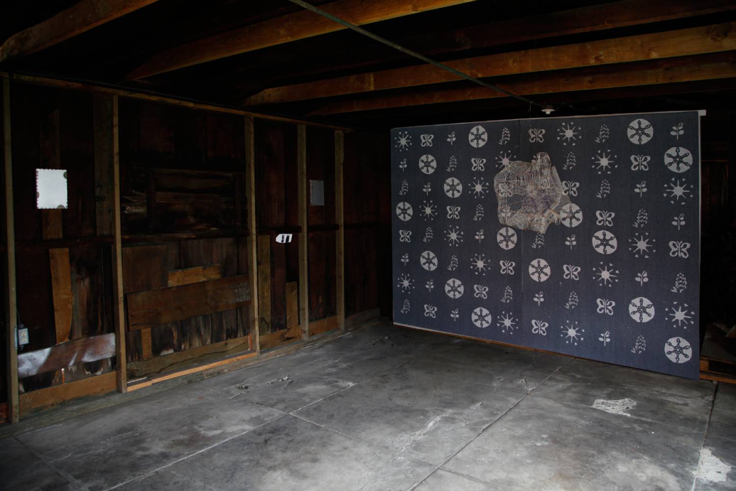 dark room with painting