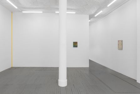 room with 2 paintings