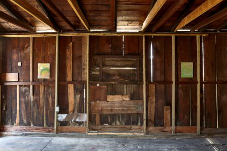 rustic room with paintings